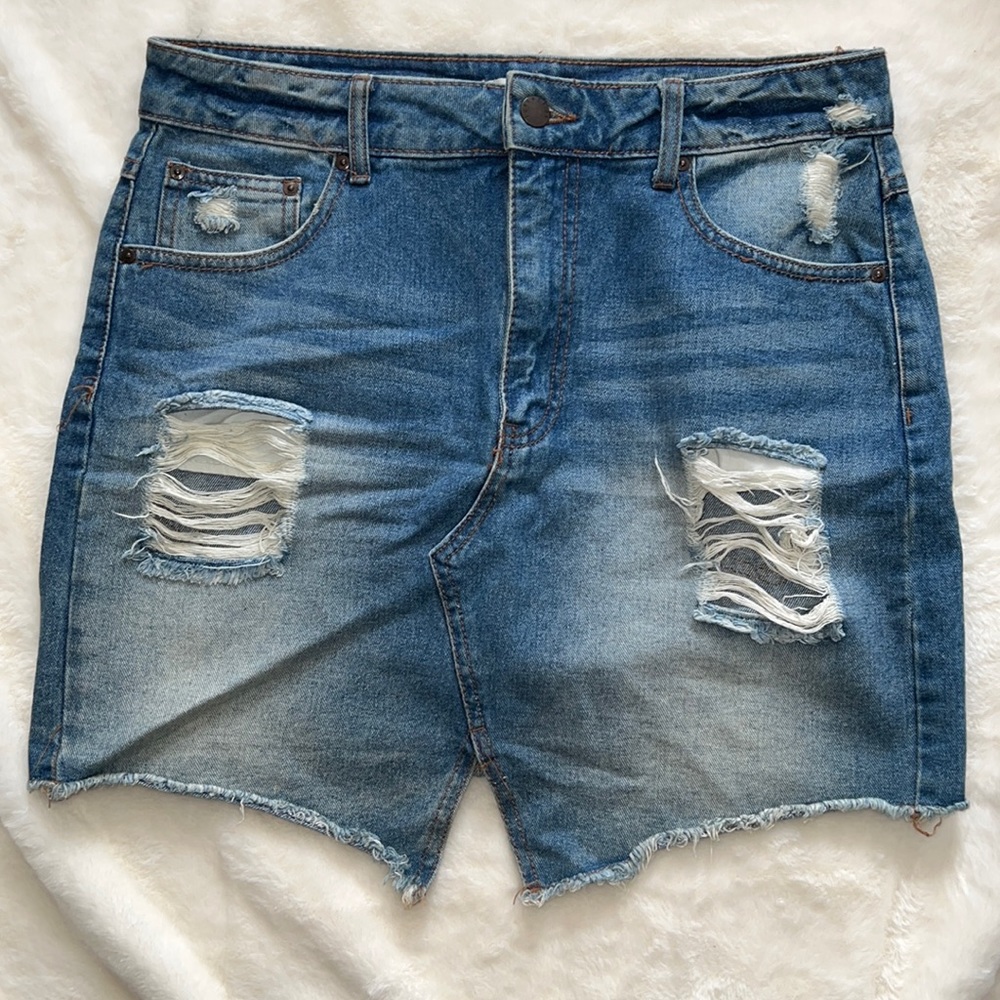 Denim distressed mini skirt